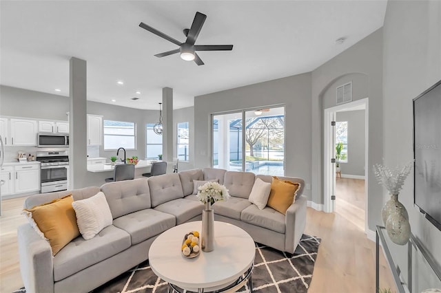14146 Cattle Egret Pl, Bradenton, FL 34202 - living room featuring ceiling fan and light hardwood / wood-style floors