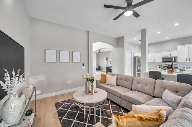 14146 Cattle Egret Pl, Bradenton, FL 34202 - living room featuring ceiling fan and light hardwood / wood-style floors