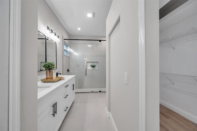 14146 Cattle Egret Pl, Bradenton, FL 34202 - bathroom with walk in shower and vanity
