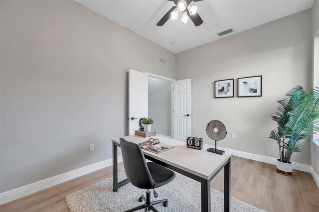 14146 Cattle Egret Pl, Bradenton, FL 34202 - home office with ceiling fan and light hardwood / wood-style floors