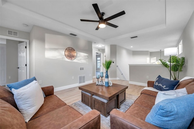 14146 Cattle Egret Pl, Bradenton, FL 34202 - living room featuring ceiling fan and light hardwood / wood-style flooring