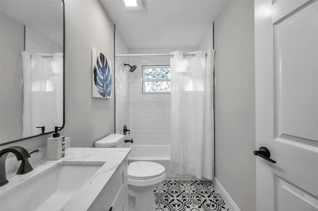 14146 Cattle Egret Pl, Bradenton, FL 34202 - full bathroom featuring tile patterned floors, toilet, vanity, and shower / bathtub combination with curtain
