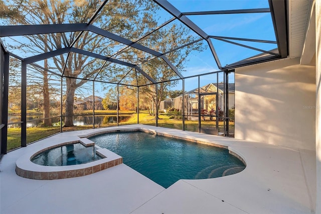 14146 Cattle Egret Pl, Bradenton, FL 34202 - view of swimming pool featuring glass enclosure, an in ground hot tub, a water view, and a patio
