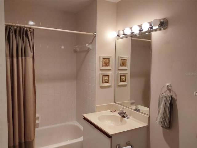 bathroom with vanity and shower / tub combo with curtain