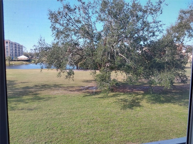 view of yard with a water view