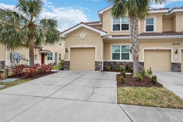 view of front of property featuring a garage