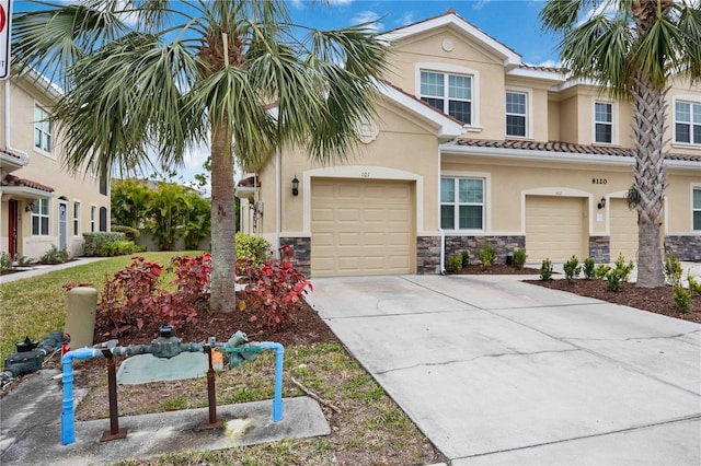 view of front of property with a garage