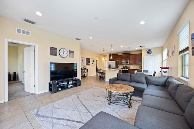 living room featuring light tile patterned flooring