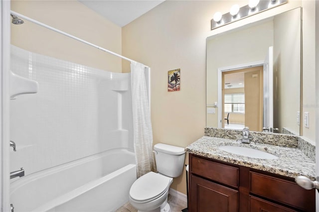 full bathroom featuring shower / bath combo with shower curtain, toilet, and vanity