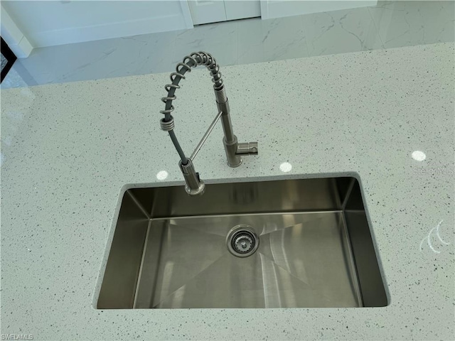 details with light stone counters and sink