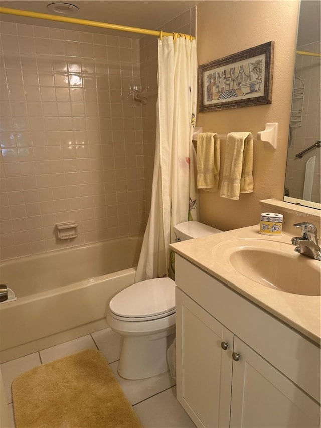 full bathroom with toilet, tile patterned flooring, shower / bath combo, and vanity