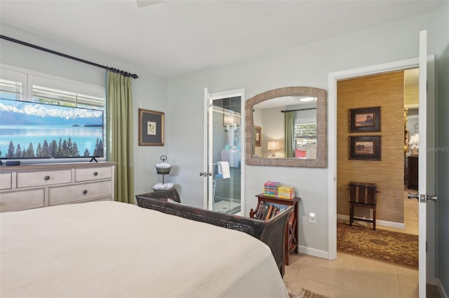 tiled bedroom with multiple windows