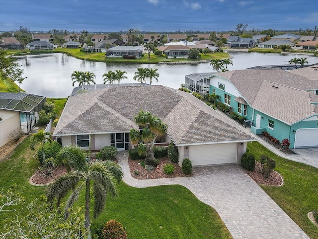 bird's eye view with a water view