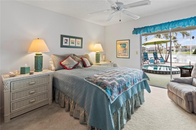 bedroom with ceiling fan, a textured ceiling, light carpet, and access to outside