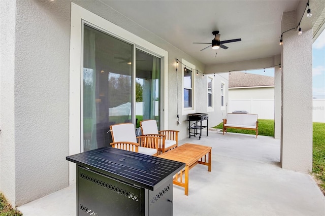 view of patio with ceiling fan