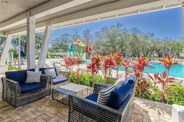 view of patio / terrace with a playground and outdoor lounge area