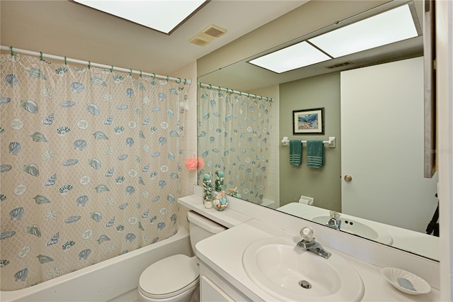 full bathroom with toilet, vanity, and shower / bath combo with shower curtain