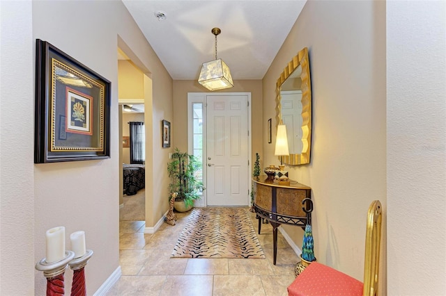 entryway featuring light tile patterned floors