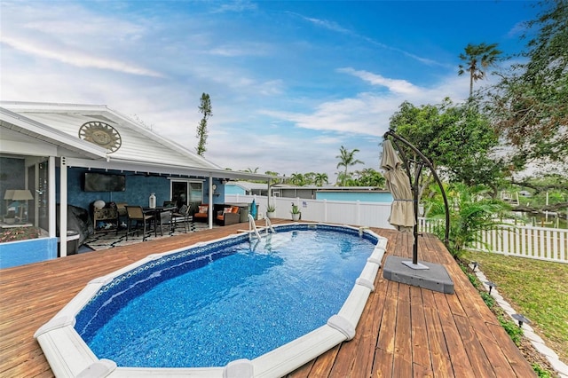 view of pool featuring a deck