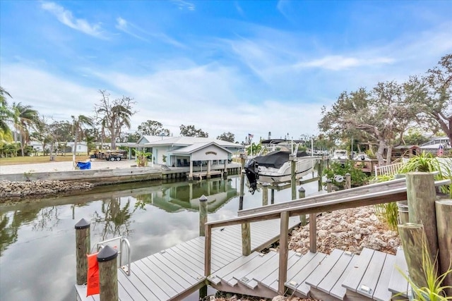 dock area featuring a water view