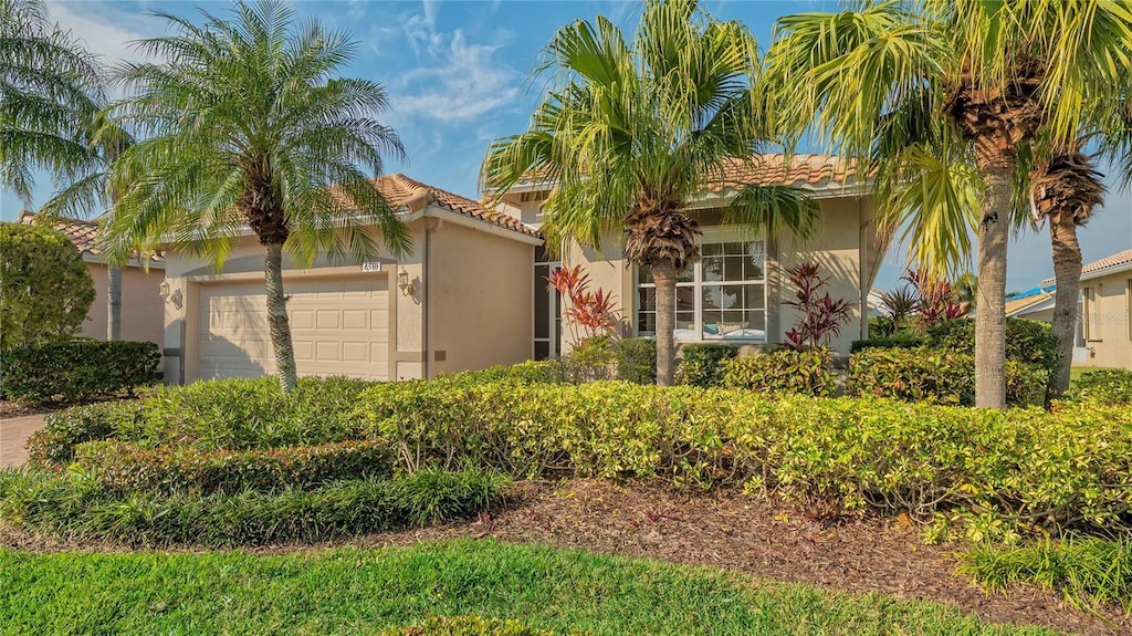 view of front of property with a garage