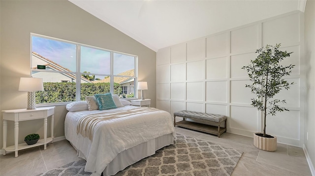 bedroom featuring vaulted ceiling