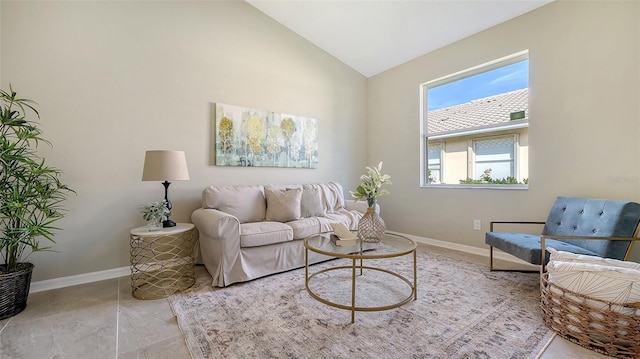 living room featuring lofted ceiling