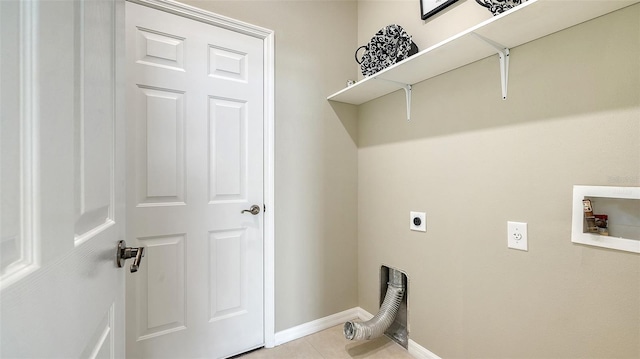 laundry area featuring hookup for a washing machine, light tile patterned flooring, and electric dryer hookup