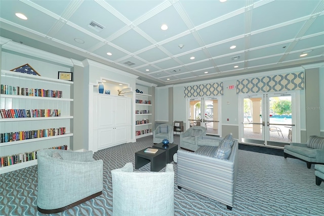 interior space featuring french doors, built in shelves, coffered ceiling, crown molding, and carpet flooring