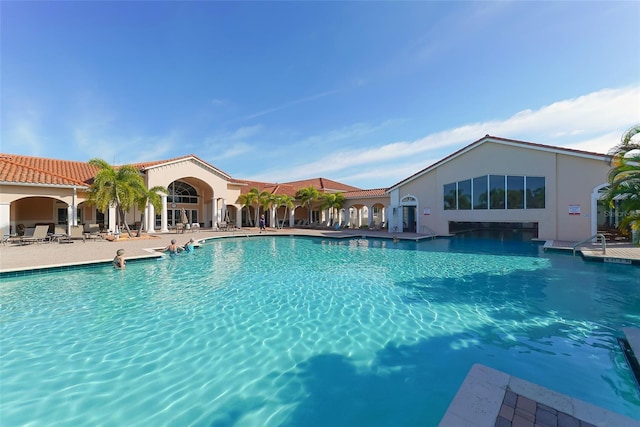 view of pool featuring a patio