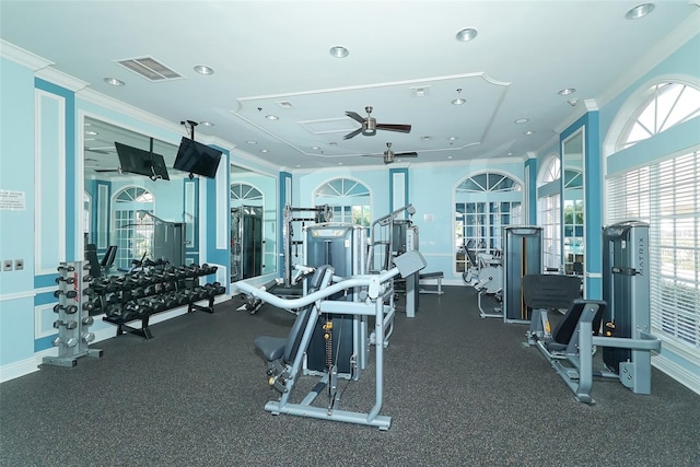 gym with ornamental molding and ceiling fan