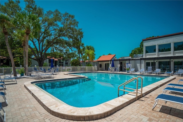 view of pool featuring a patio area