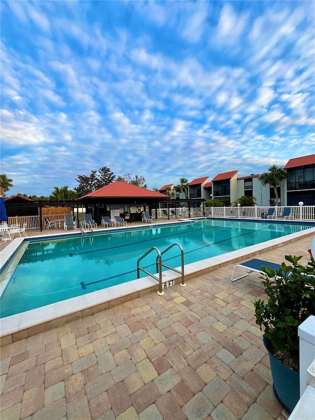 view of swimming pool featuring a patio