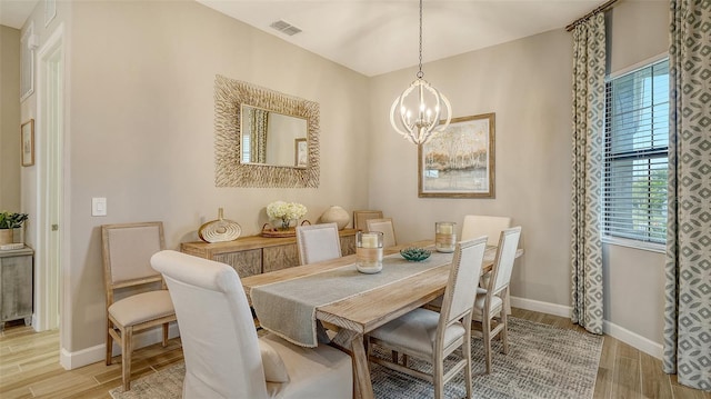 dining room featuring a chandelier