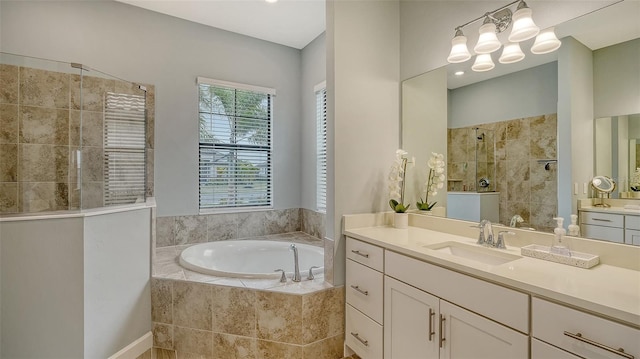 bathroom with vanity and plus walk in shower