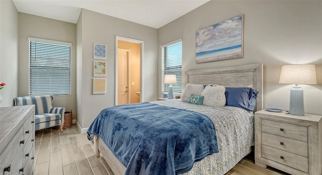 bedroom featuring ensuite bath