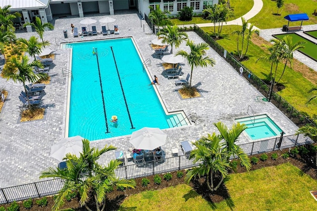 view of swimming pool featuring a patio area