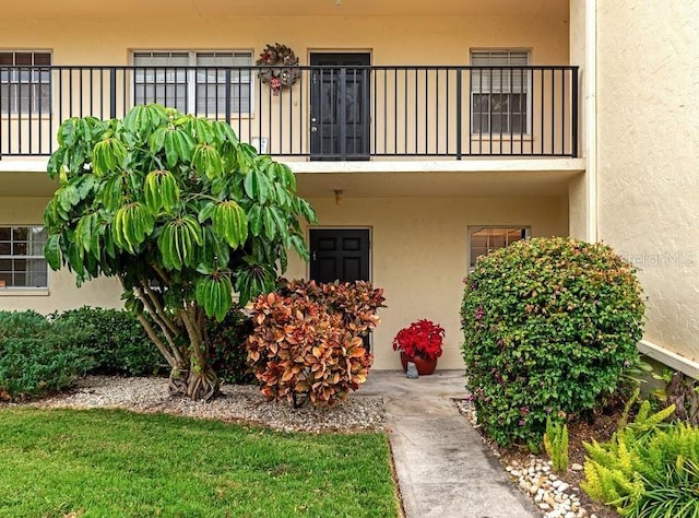 doorway to property with a balcony