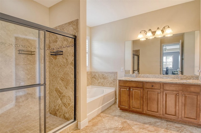 bathroom with plus walk in shower and vanity