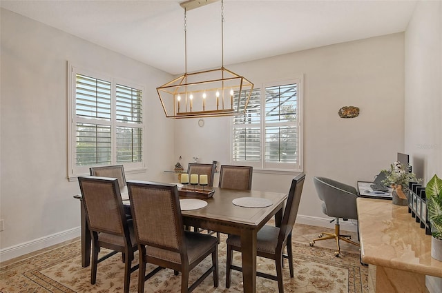 dining space with an inviting chandelier and plenty of natural light