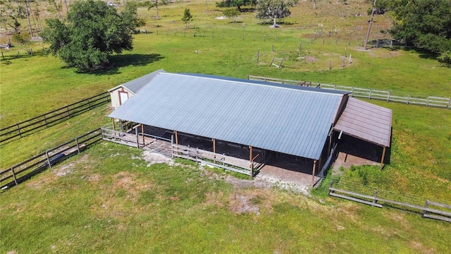 birds eye view of property with a rural view