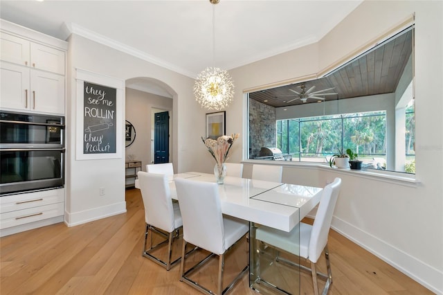 dining area featuring ceiling fan, ornamental molding, and light hardwood / wood-style floors