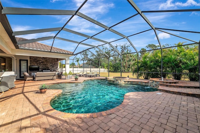 view of pool with an outdoor living space, an in ground hot tub, pool water feature, glass enclosure, and a patio