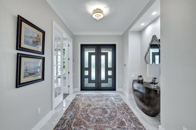 entryway featuring french doors