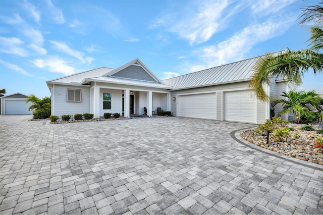 view of front of property featuring a garage