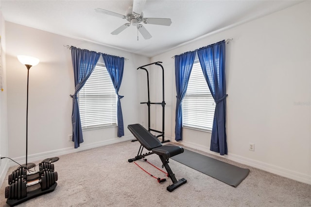 exercise area with ceiling fan, carpet, and a healthy amount of sunlight