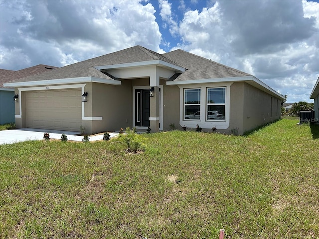 2648 Averland Loop, North Port, FL 34287 - view of front facade with stucco siding, a shingled roof, a garage, and a front yard