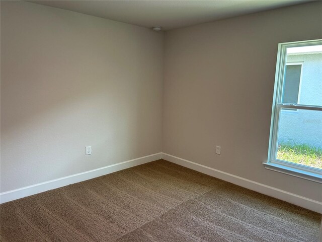 2648 Averland Loop, North Port, FL 34287 - unfurnished room featuring carpet floors and a smoke detector