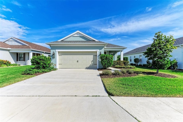 single story home with a garage and a front lawn