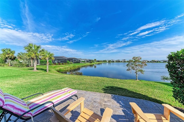 view of patio featuring a water view